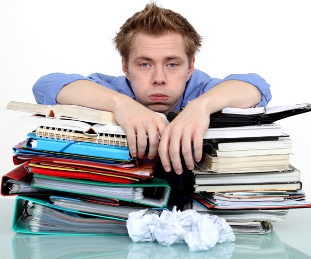 a man holding hands on books